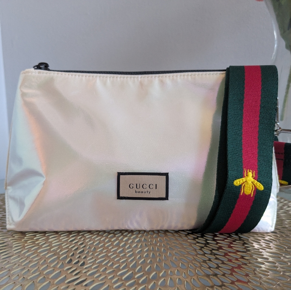 Gucci Silver Cosmetic Bag with Vibrant Floral Lining and Silver Zipper